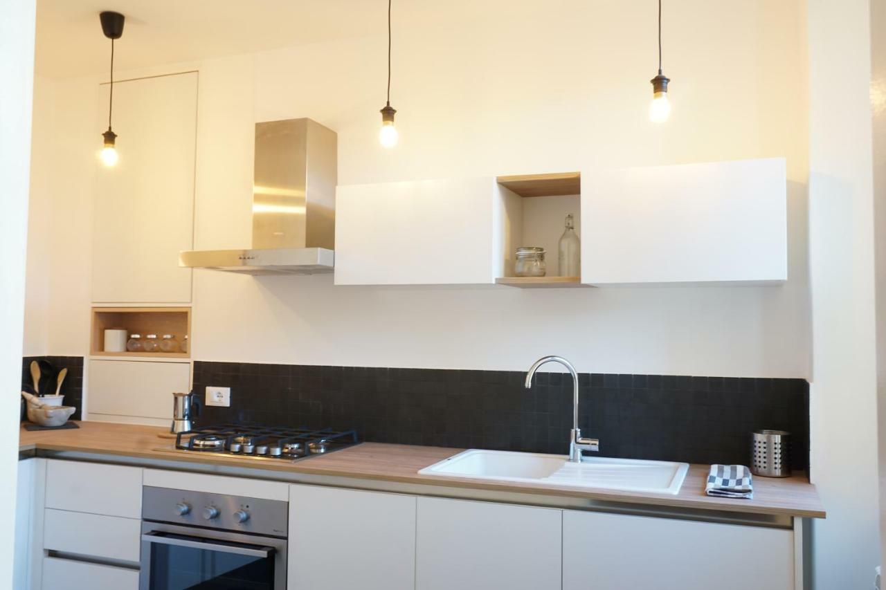 La Piazzetta Apartment บอร์ดิเกรา ภายนอก รูปภาพ